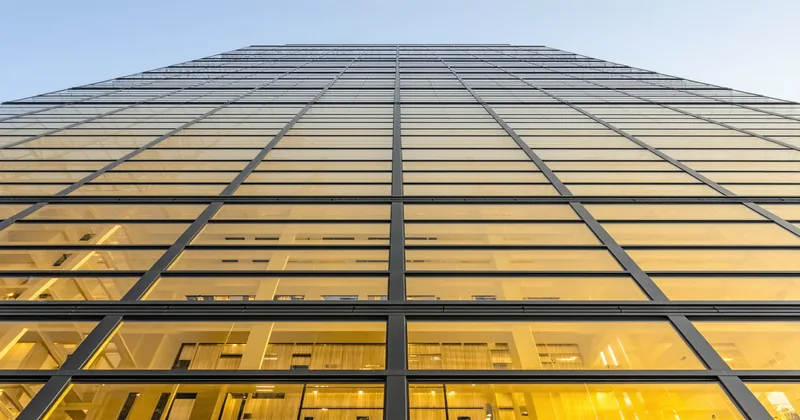 Office building exterior with reflective glass facade